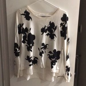 Open back sweater with crepe lining and underlay.